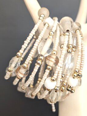 Memory wire cream seed bead and glass beaded bracelet with gold bead accents